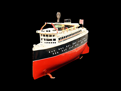 Old tin toy clock work ship